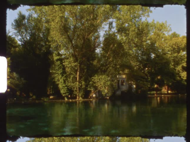 A small shelter is by the water