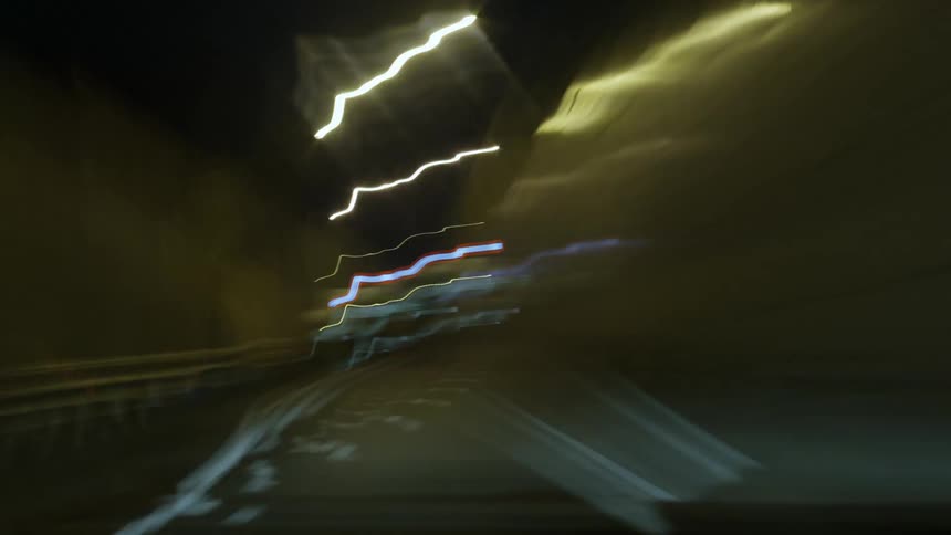 A sped up view of driving through a city