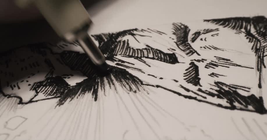 A person is drawing with a pen