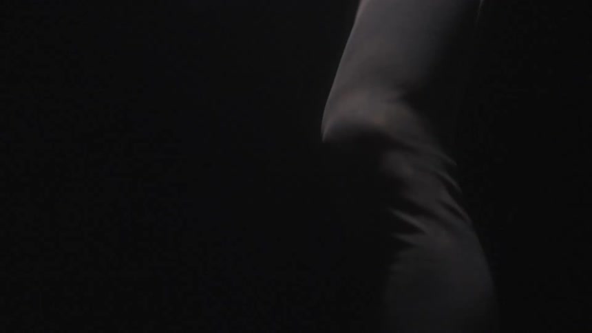 A person is running in the dark