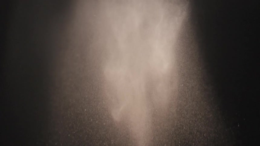 Dust falls in the dark area
