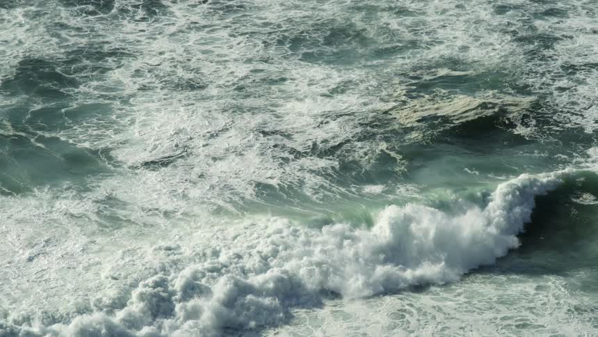 An aerial view of ocean waves