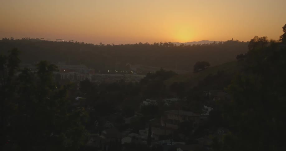 The sun is setting on the town