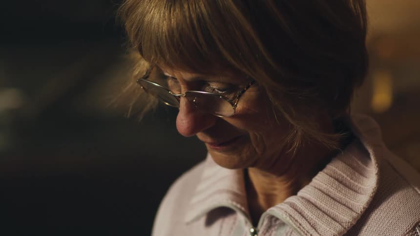 A woman is looking at something