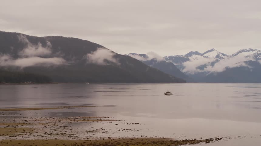 A single boat is in the water