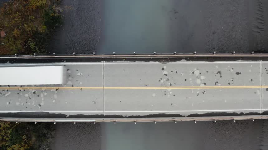 Vehicles travel over the bridge