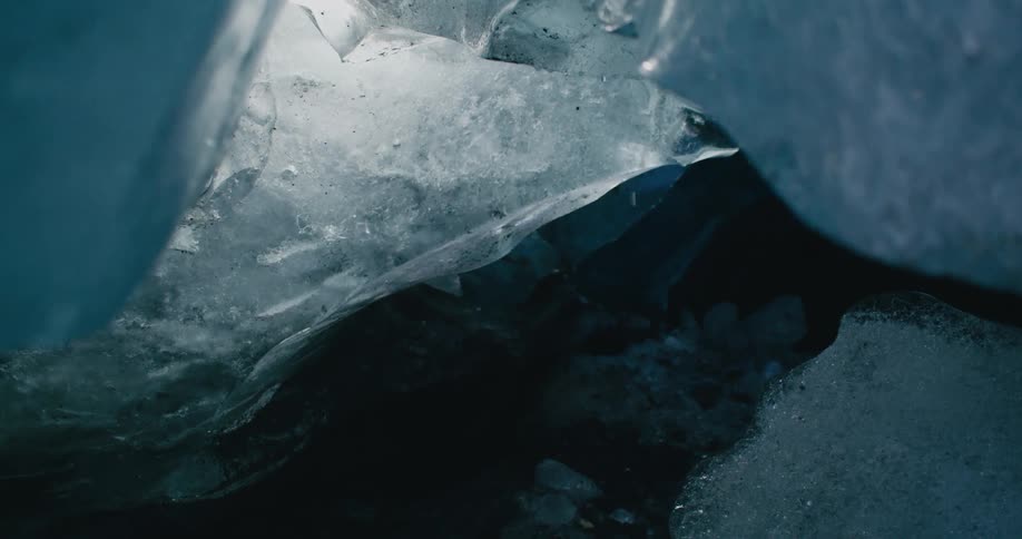 Water drips as a large chunk of ice melts