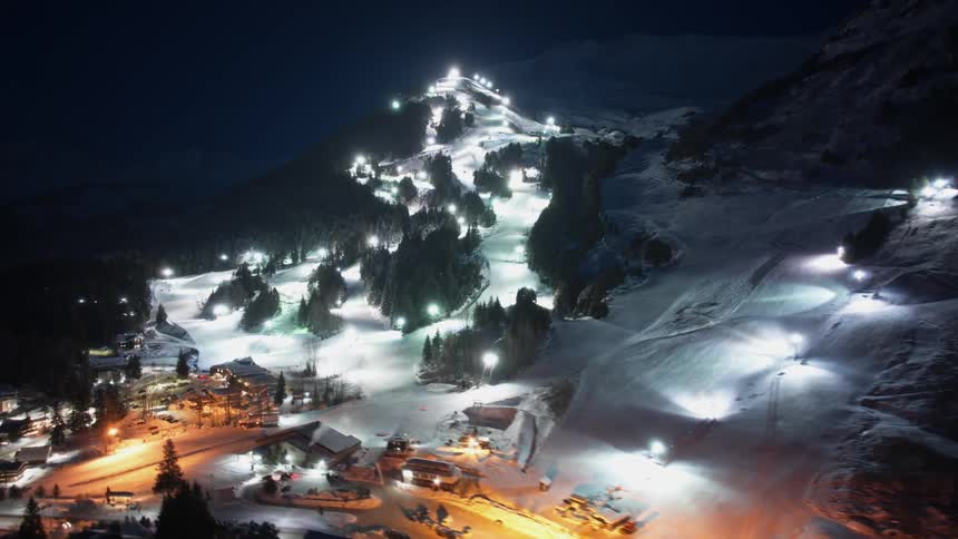 An aerial view of a mountain at night