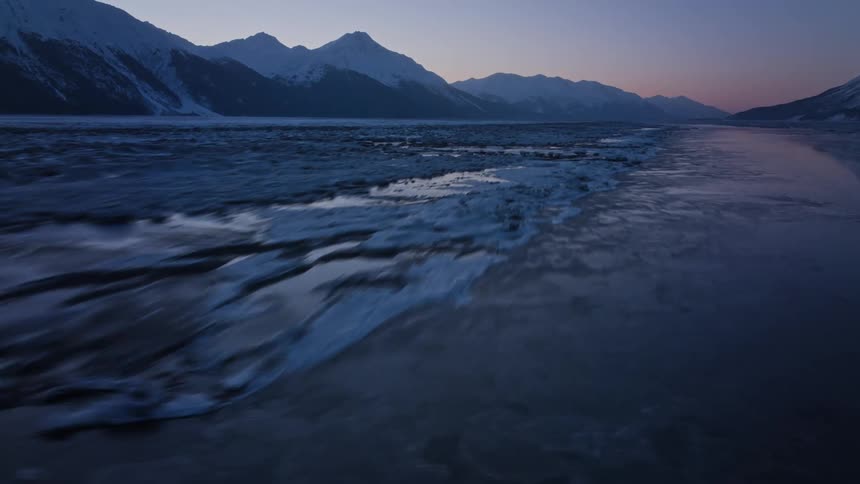 The water is covered with ice