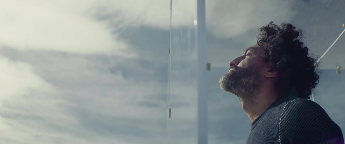 A man looks outside