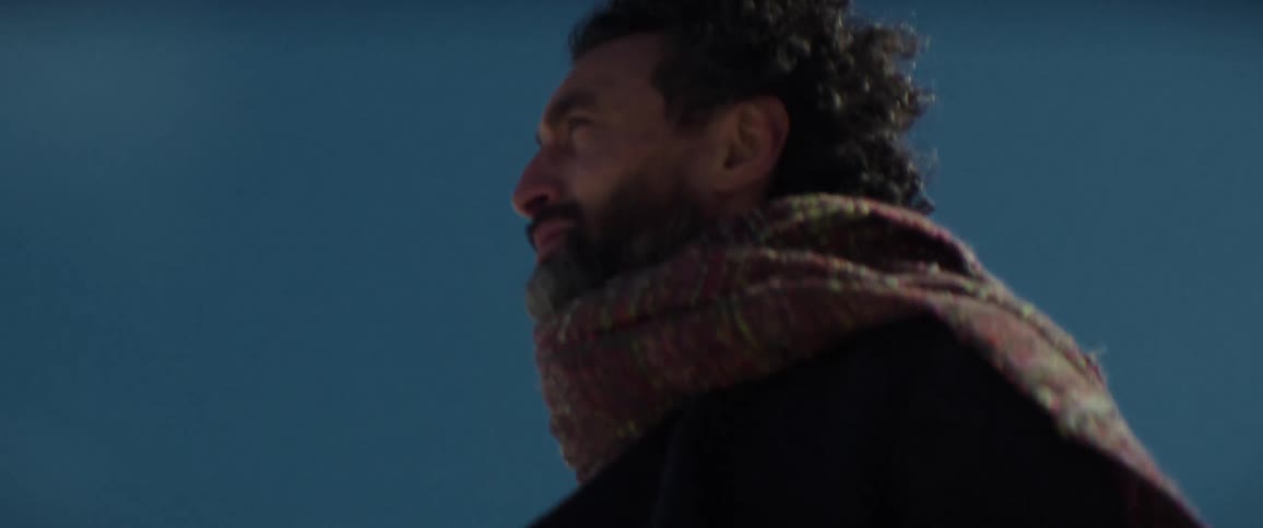 A man is walking outside