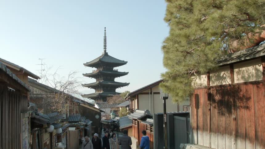 A pagoda sits at the end of a street