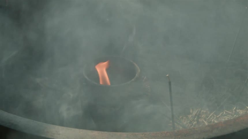 A fire is burning in a pipe