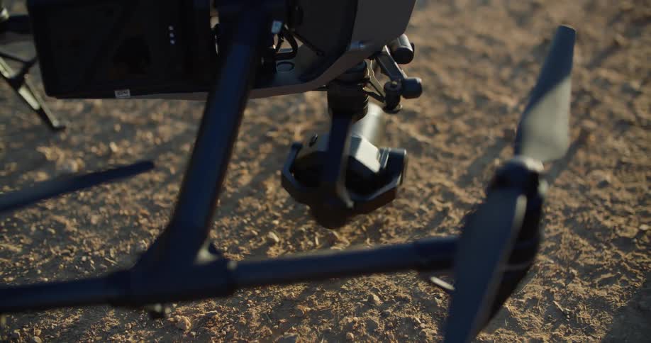 A rotating lens on a metal frame
