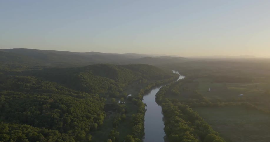 A river through a hilly forest