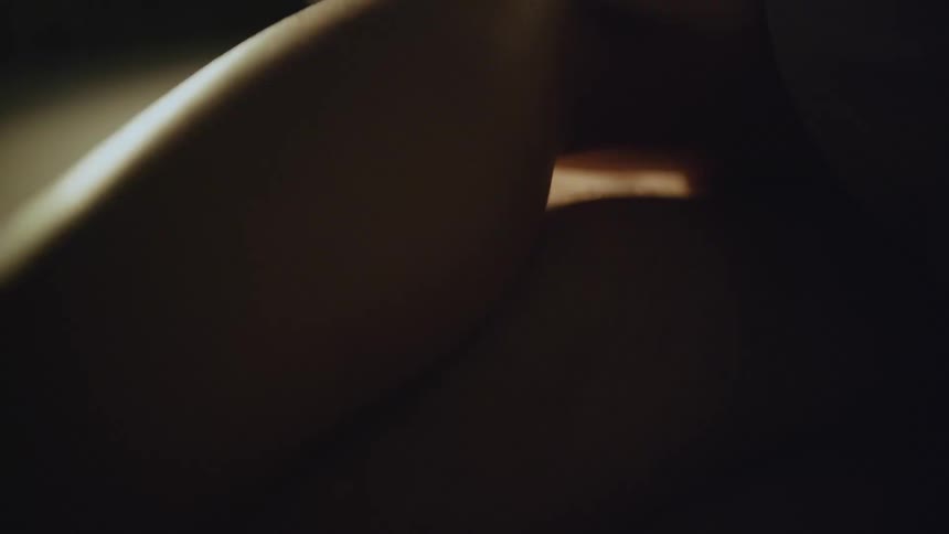 persons leg and feet slwoly moving in bed