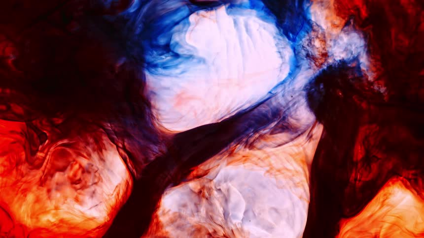 Colorful mounds of a foamy substance expand as they rise