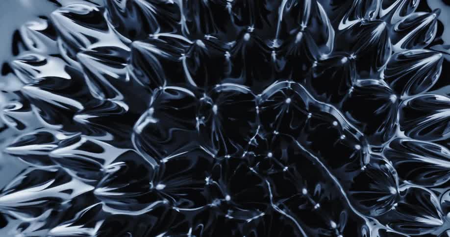 A rippling shiny black liquid