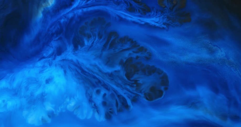 Abstract footage of liquid dye mixing together