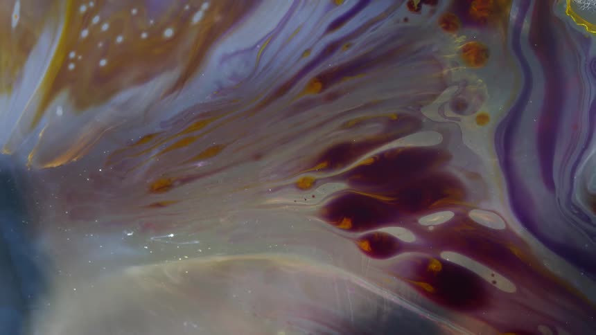 Multicolored streaks flow and spread
