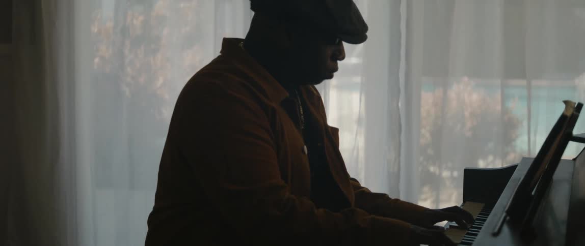 A man playing a piano