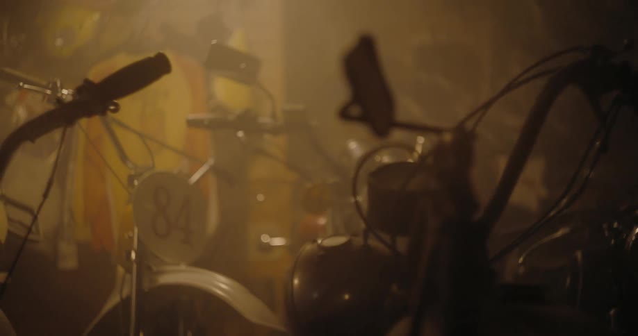 Bicycles stored in a dimly lit garage