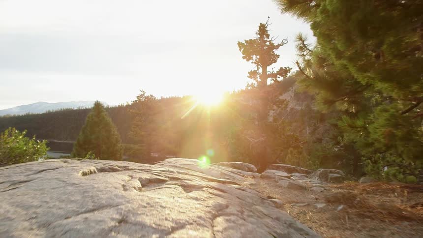 The sun rises over some mountains