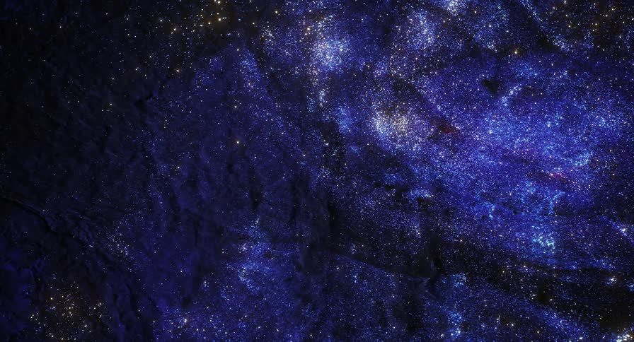 A graphic design mimics stars shimmering in the night sky