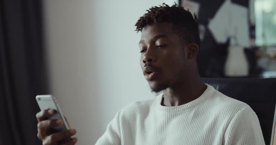 A man talking on a smart phone