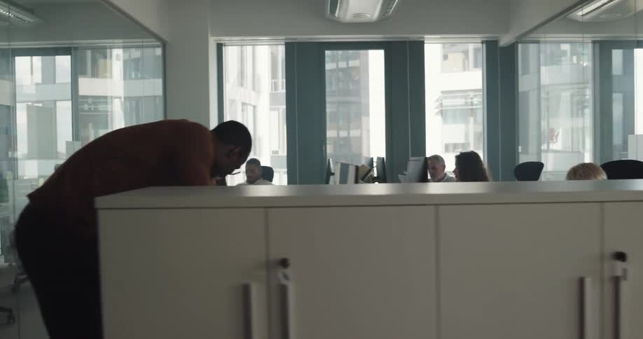 A lot of workers together in an office