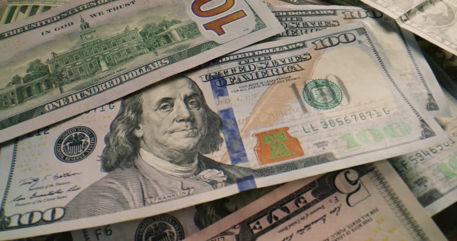 United states bank notes piled on a flat surface