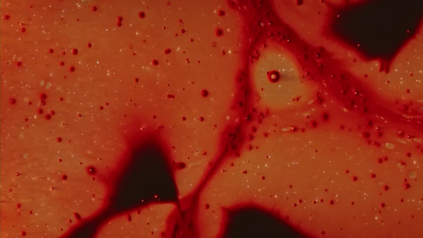 Flowing abstract red liquid