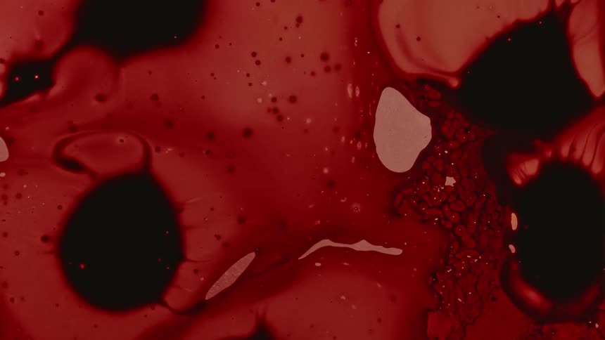 Flowing abstract dark red liquid