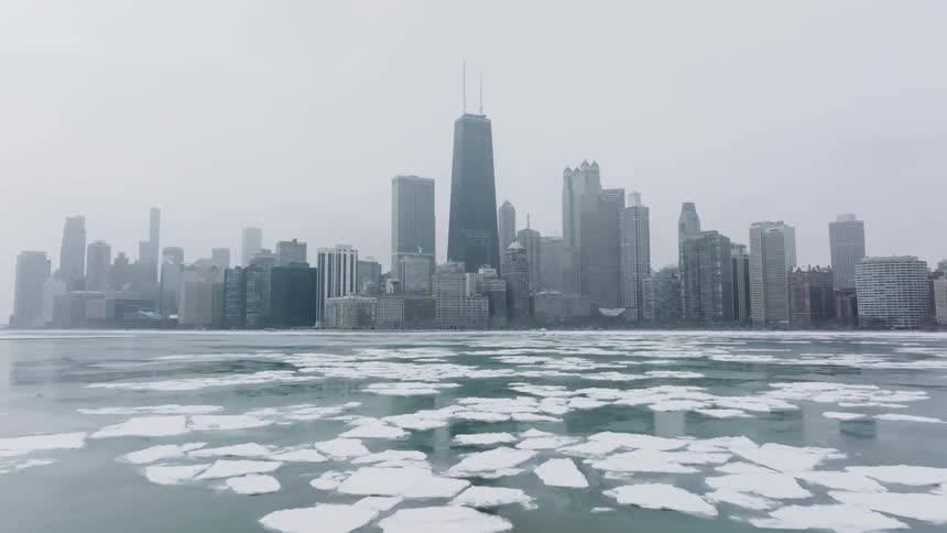 Melted chunks of ice sit on the surface of Lake Michigan