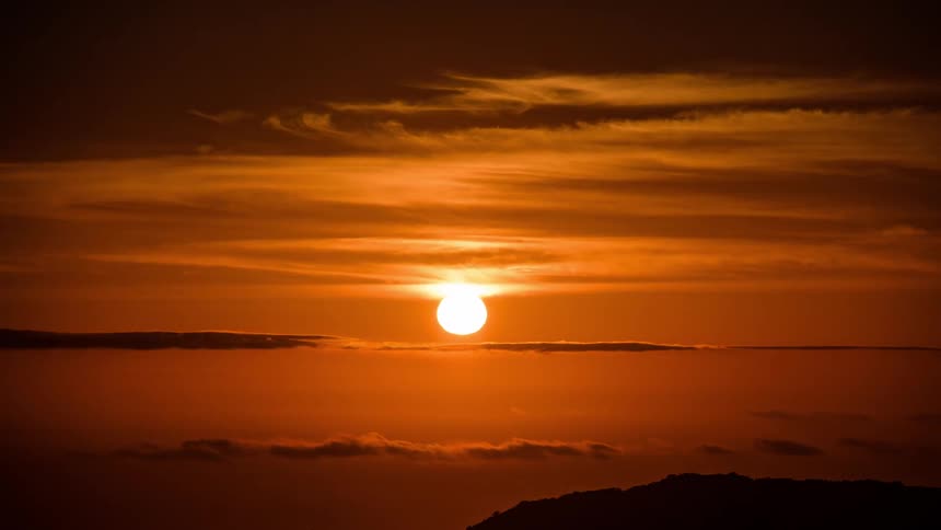 A view of the sun setting outdoors