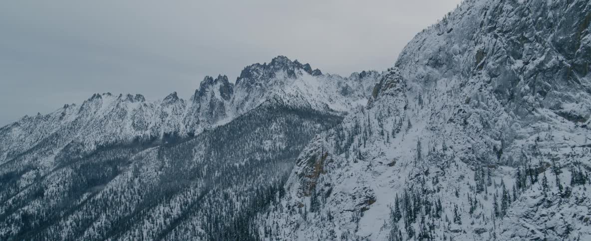 Aerial over snowcapped mountains