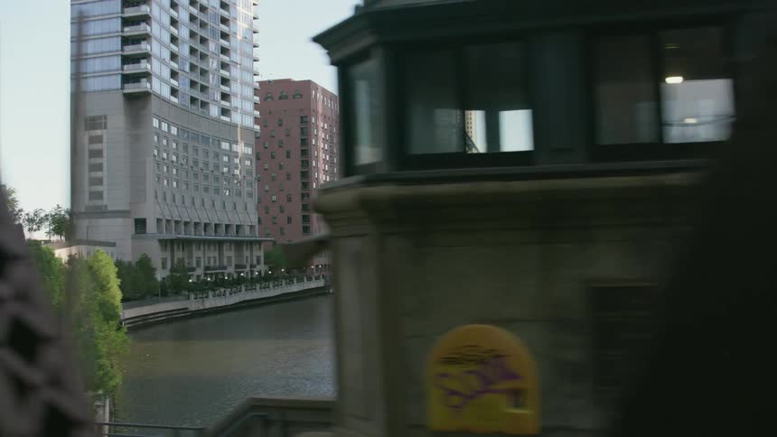 A bridge is raised over the chicago river near downtown
