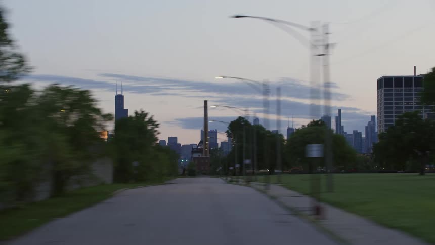 Vehicles drive on on the outskirts of downtown chicago