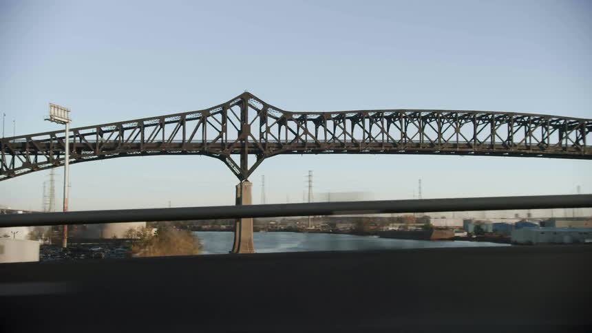 Vehicles travel over the bridge
