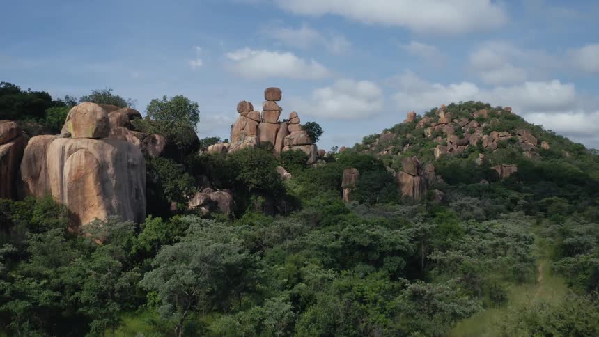 Stacked rock formations in jungle landscape
