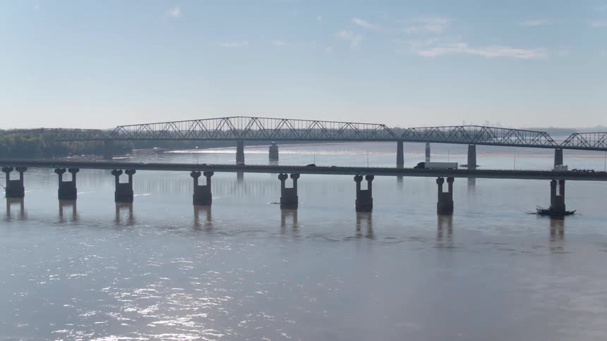 Vehicles travel over the bridge