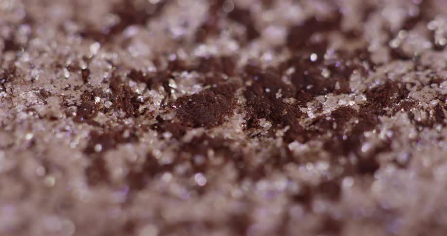 Dirt sits on top of a pile of rock salt