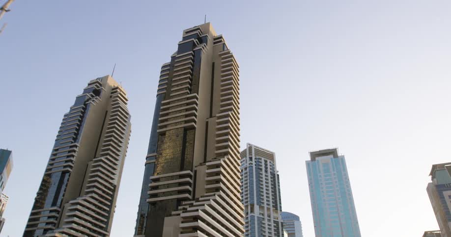 Tall buildings stand high in a city downtown section