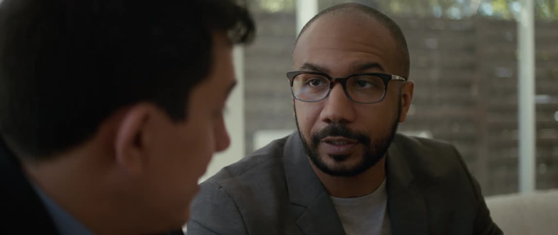 Two men are talking in the home