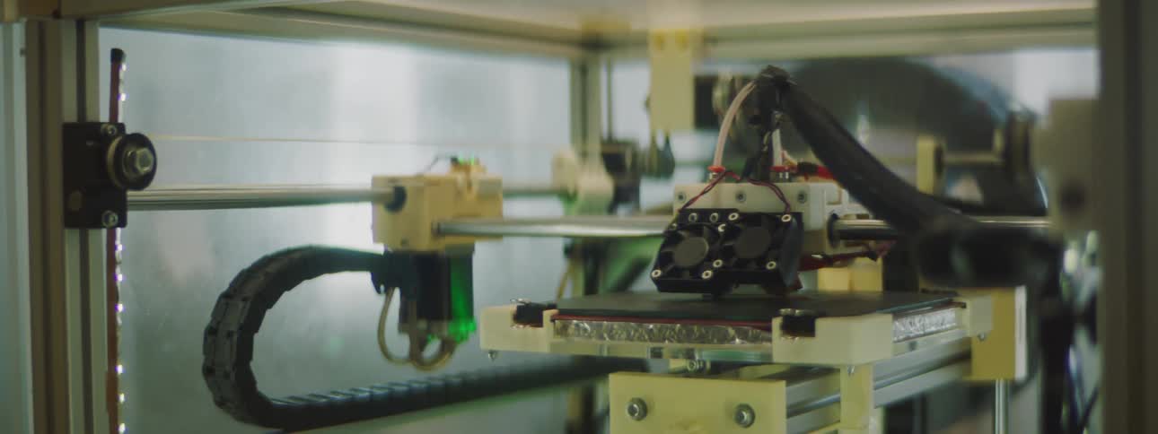 A machine is assembling something