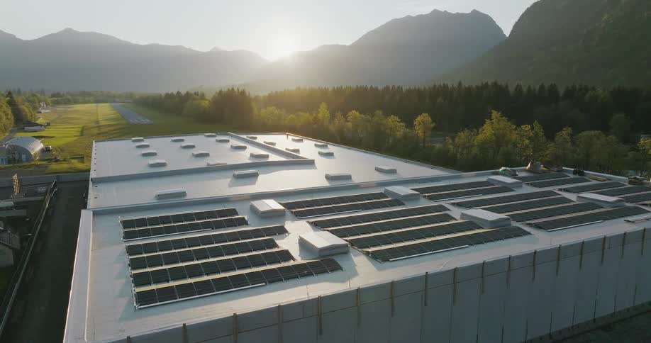 Aerial shot of the top of a building by a runway
