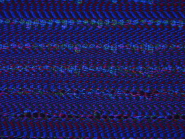 A view of an old screen with blue lines on it