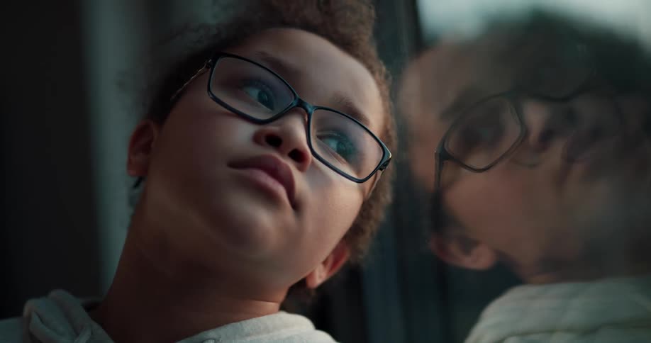 A child looking out a window