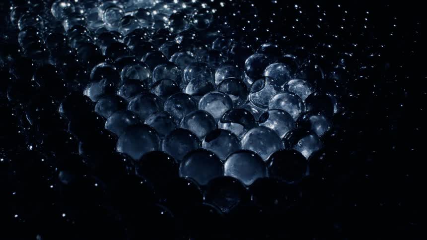 Light reflects on the crystal balls