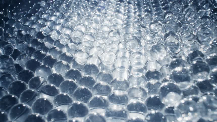 Light reflects on the crystal balls